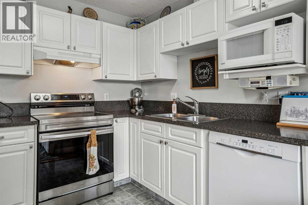 219 Mt Douglas Manor Se, Calgary, Alberta  T2Z 3C8 - Photo 10 - A2226255