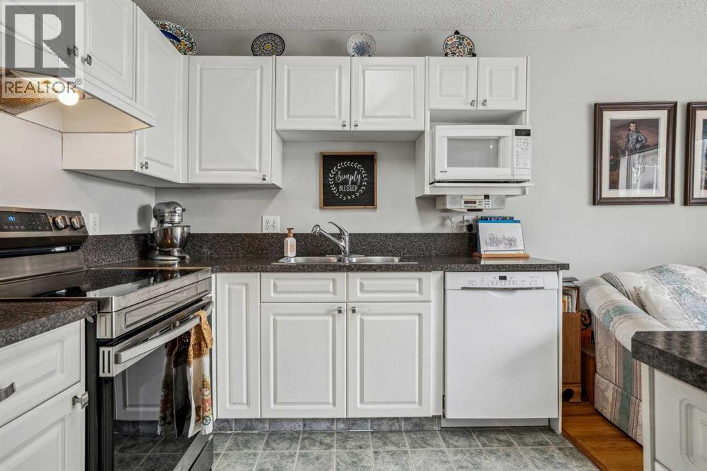 219 Mt Douglas Manor Se, Calgary, Alberta  T2Z 3C8 - Photo 11 - A2226255