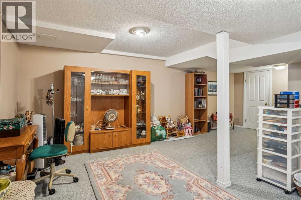 219 Mt Douglas Manor Se, Calgary, Alberta  T2Z 3C8 - Photo 23 - A2226255