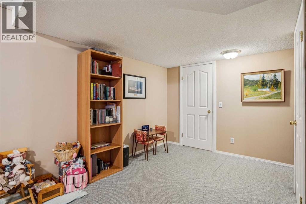 219 Mt Douglas Manor Se, Calgary, Alberta  T2Z 3C8 - Photo 24 - A2226255