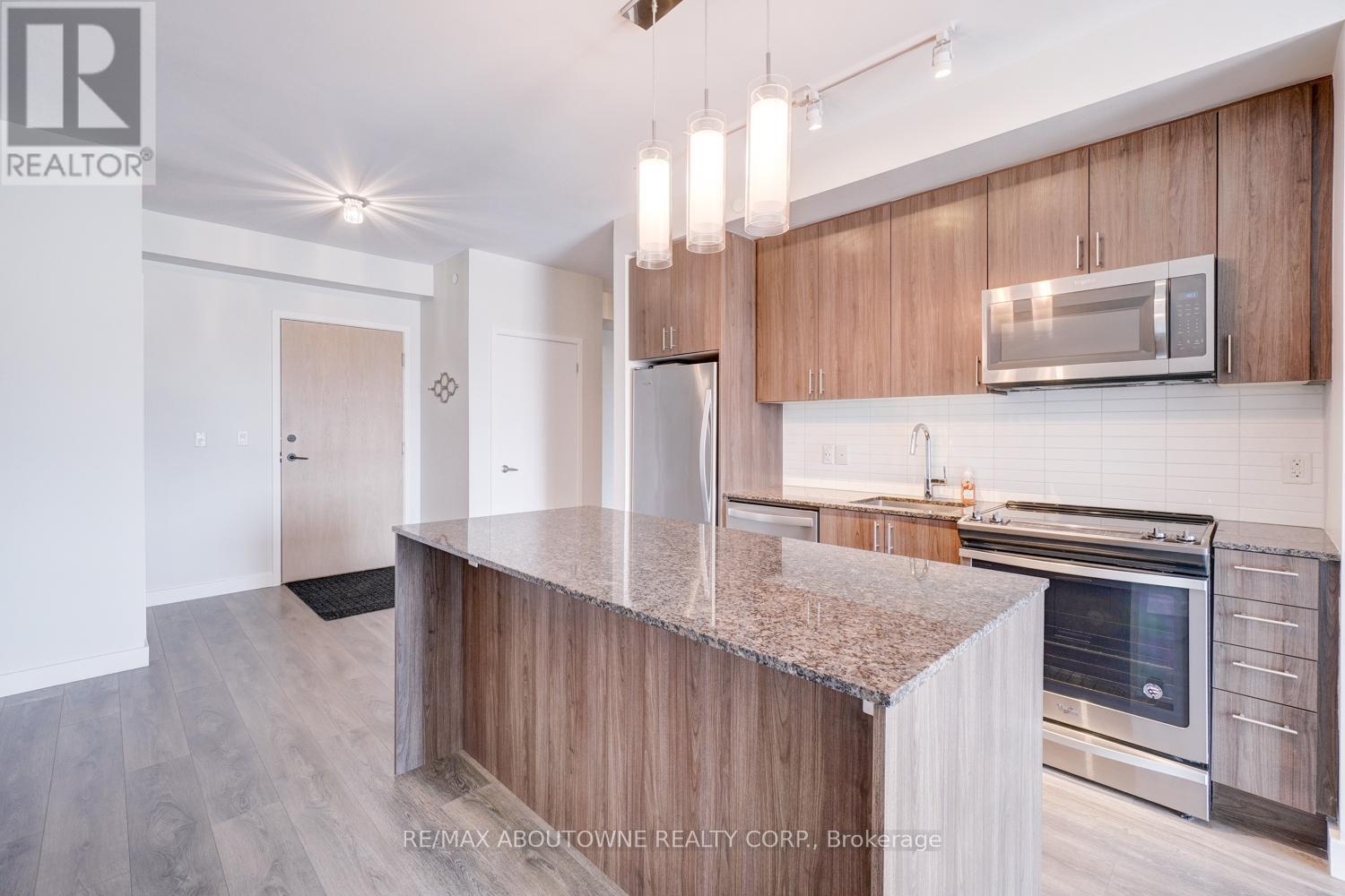 302 - 150 Sabina Drive, Oakville, Ontario  L6H 7C3 - Photo 19 - W12451700
