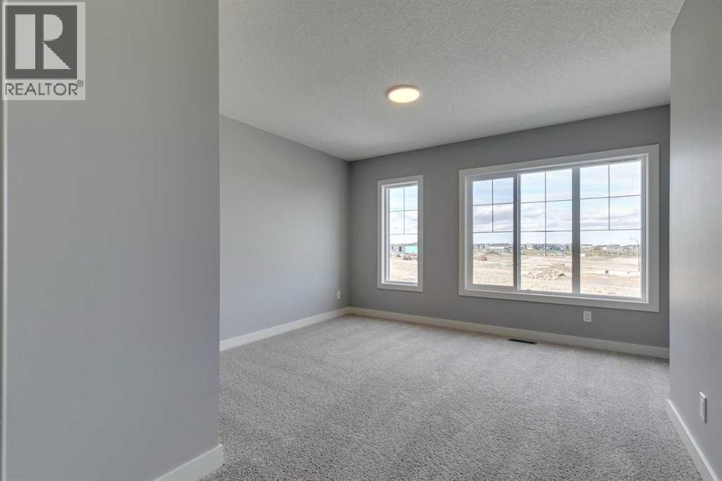 23 Creekstone Green Sw, Calgary, Alberta  T2X 5W4 - Photo 32 - A2216897