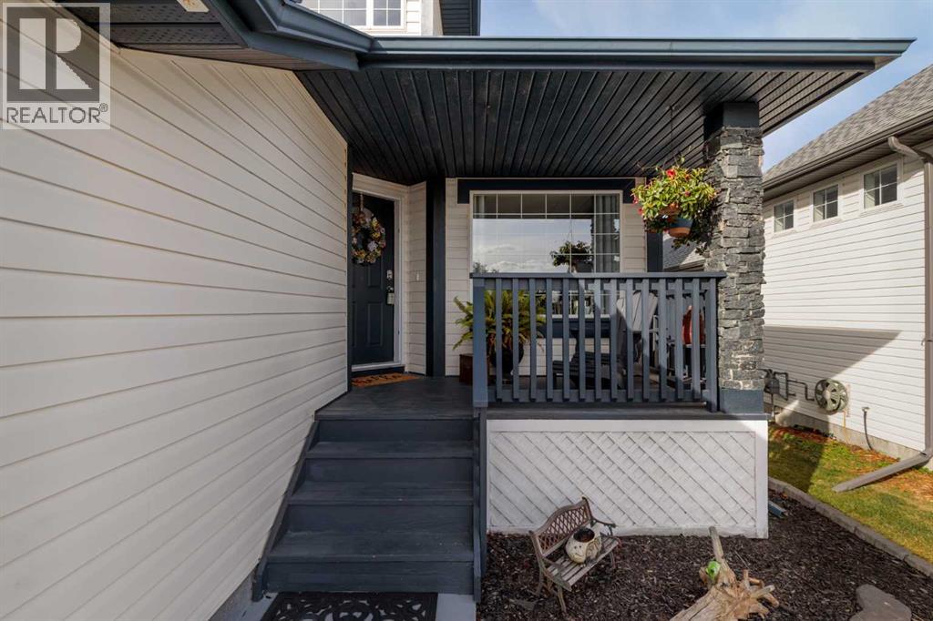 110 Rocky Ridge Green Nw, Calgary, Alberta  T3G 4R6 - Photo 2 - A2261679