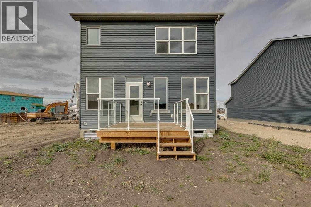 31 Creekstone Green Sw, Calgary, Alberta  T0L 0X0 - Photo 3 - A2242618