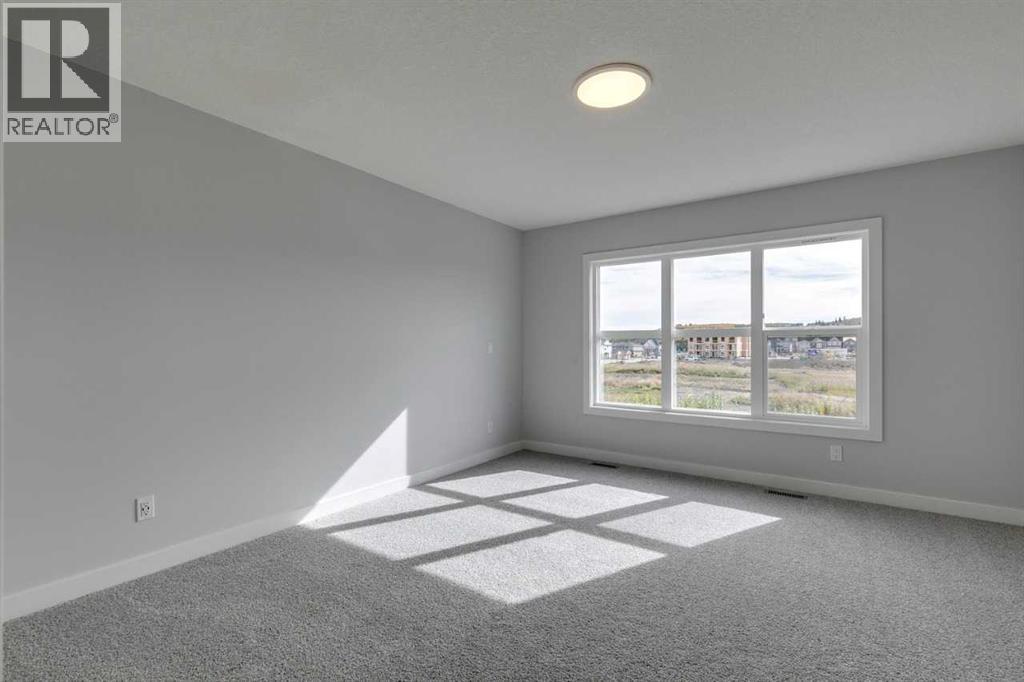 31 Creekstone Green Sw, Calgary, Alberta  T0L 0X0 - Photo 30 - A2242618