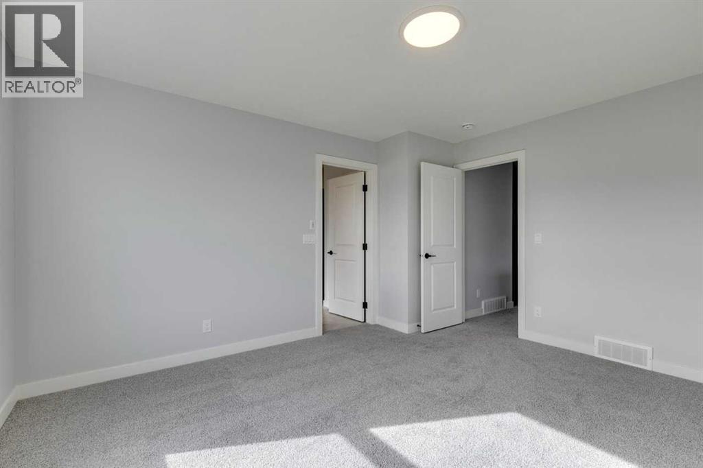 31 Creekstone Green Sw, Calgary, Alberta  T0L 0X0 - Photo 32 - A2242618