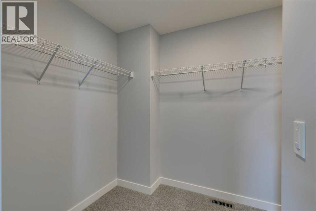 31 Creekstone Green Sw, Calgary, Alberta  T0L 0X0 - Photo 37 - A2242618