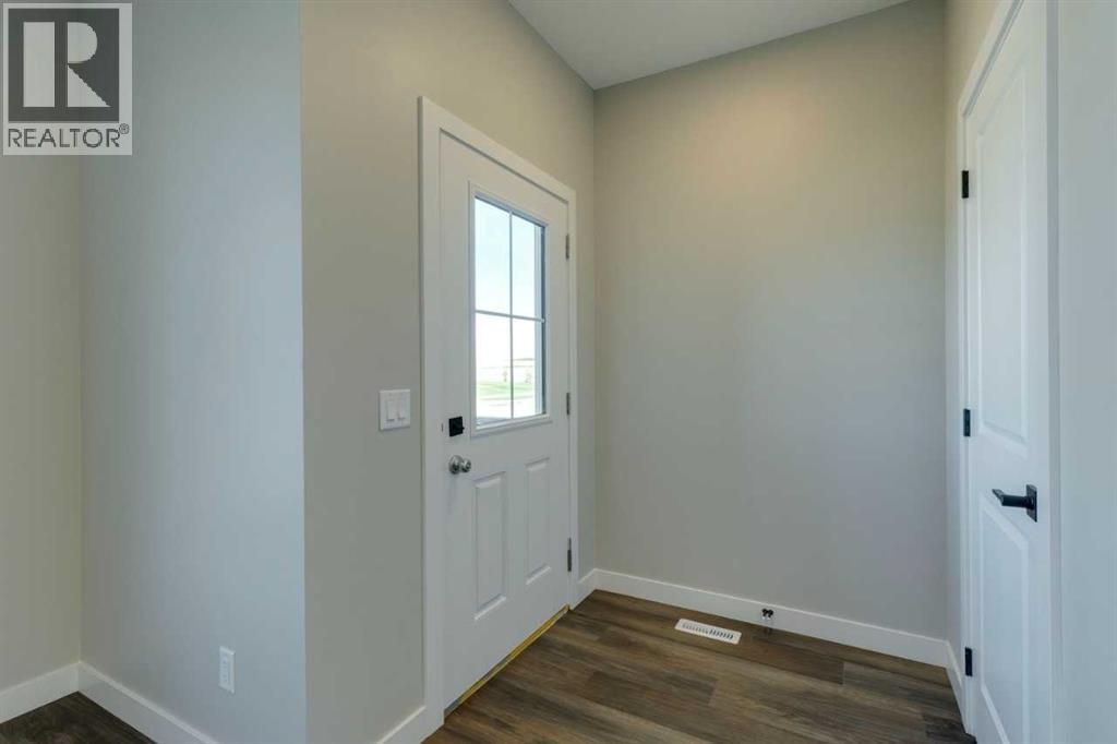 137 Ambleton Boulevard Nw, Calgary, Alberta  T3P 1W6 - Photo 4 - A2240115
