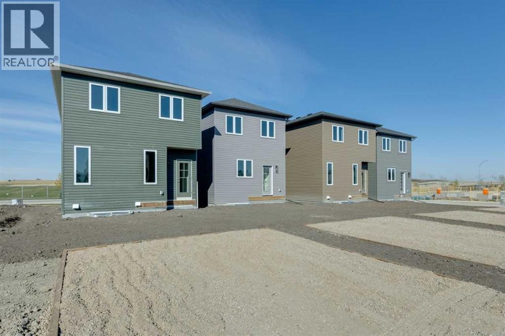 137 Ambleton Boulevard Nw, Calgary, Alberta  T3P 1W6 - Photo 3 - A2240115
