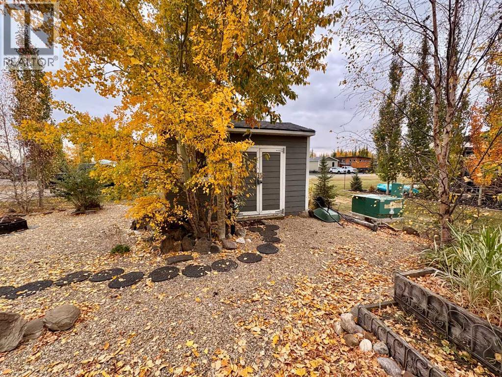 Are you ready to own your spectacular lake lot in phase 1 at Sandy Point located on the west side of Gull Lake!  This gorgeous lot has lots of mature trees providing shade and privacy.  Imagine sitting by the firepit on those warm sunny evenings and enjoying company who can park right next door in the guest parking!  A 10 x 15 shed with hardy board siding plus a washer & dryer, built in shelving and ample storage come with the property.  This lot supports a wide range of housing options including a park model, motorhome, manufactured home, fifth wheel  or trailer.  The lot measures 45' wide by 95' deep with enough room for 2 vehicles, plus a boat and golf cart.  Sandy Point is a gorgeous gated community  with amenities that include GOLF COURSE, playgrounds, laundry facilities, showers, bathrooms, laundry facilities and of course the BEACH!  This lot also features some raised garden beds for your herbs and/or flowers.  Other amenities that are close are a seasonal restaurant with a rooftop patio, convenience store, marina with propane and gas facilities, driving range,  gated storage compound, and community garden area.  MAKE THIS LOT YOURS TODAY! (id:48254)