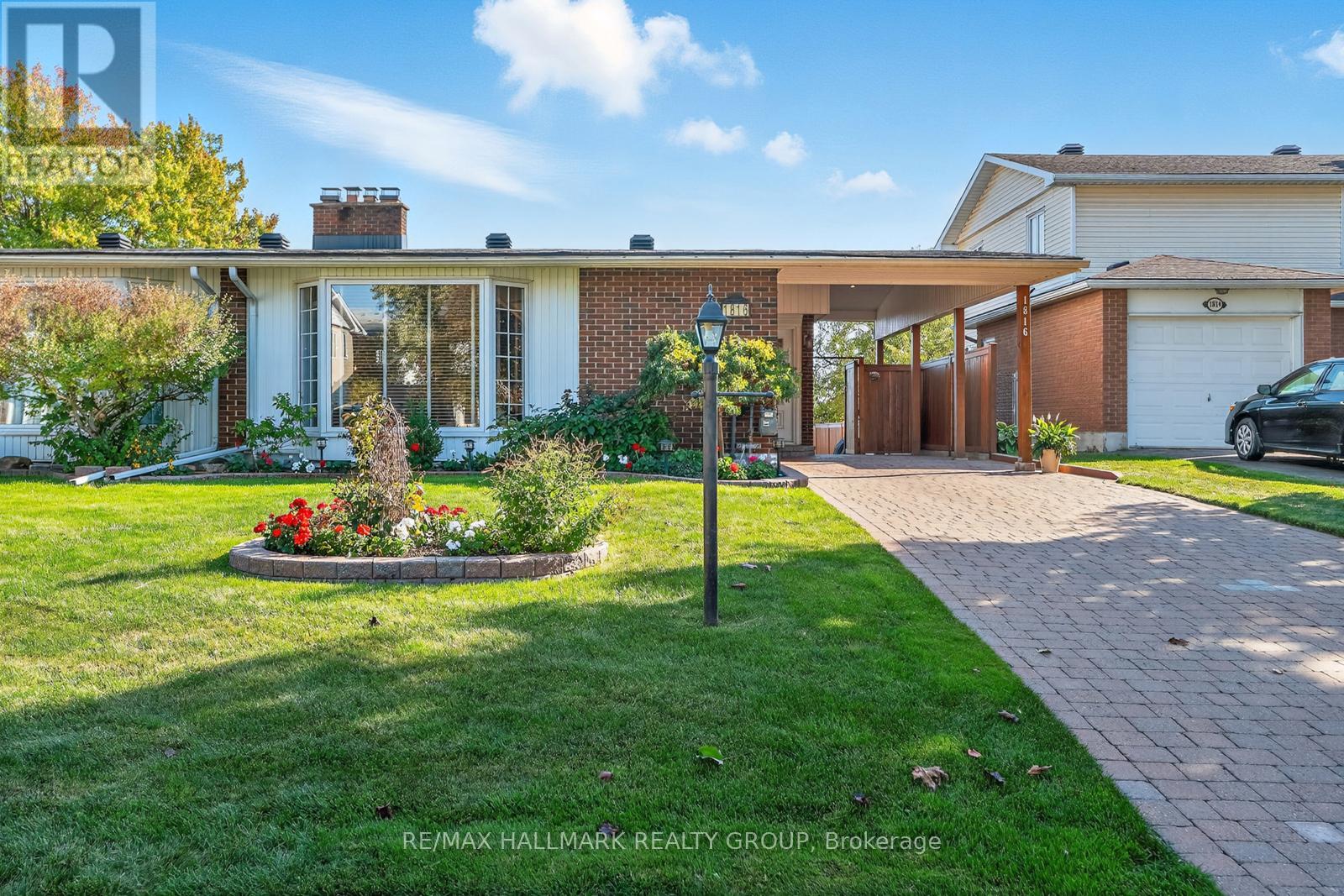 1816 APPLEGROVE COURT is a beautiful, meticulously maintained 3 bedroom 2 full bathrooms (1 bed up & 2 down ) semi-detached bungalow in premium condition. Long term owners have this place showing like a model home - pride of ownership is evident throughout with the brand new kitchen from 2022, new cabinetry,  quartz counter top, soft-close drawers, pot lighting & task lighting, ceramic back splash, new tiled flooring, custom built opening/pass through to living area - really gives an open feel. Kitchen with all stainless steel appliances including hood fan/microwave. Electronic window shade(s), hardwood flooring mostly throughout - L shaped living/dining room, front facing bay window, wood burning "brick" fireplace, large luxurious master bedroom c/w vaulted ceilings, 4 piece ensuite with make up counter, glass block, night vanity with sink, double sink plus a walk-in cedar closet. Master has sliding patio doors out to the SOUTH FACING BACK YARD, WITH IN GROUND POOL AND NO REAR NEIGHBOURS. Oh and by the way, this is all on a child safe CUL-DE-SAC with no through traffic. Downstairs are two spacious bedrooms loads of natural light through the over sized windows (south facing), a four piece bathroom, furnace/utility room, a laundry room plus a really comfortable family room with high ceilings and built in storage areas. Off the downstairs bathroom is more storage. Backyard heated inground pool is accessible also through the oversized carport, carport and driveway all interlocked, and again beautifully maintained.  24 X 13 inground pool with many updates - backyard shed c/w electricity. Our new house is being built so a long closing date preferred. (id:48254)