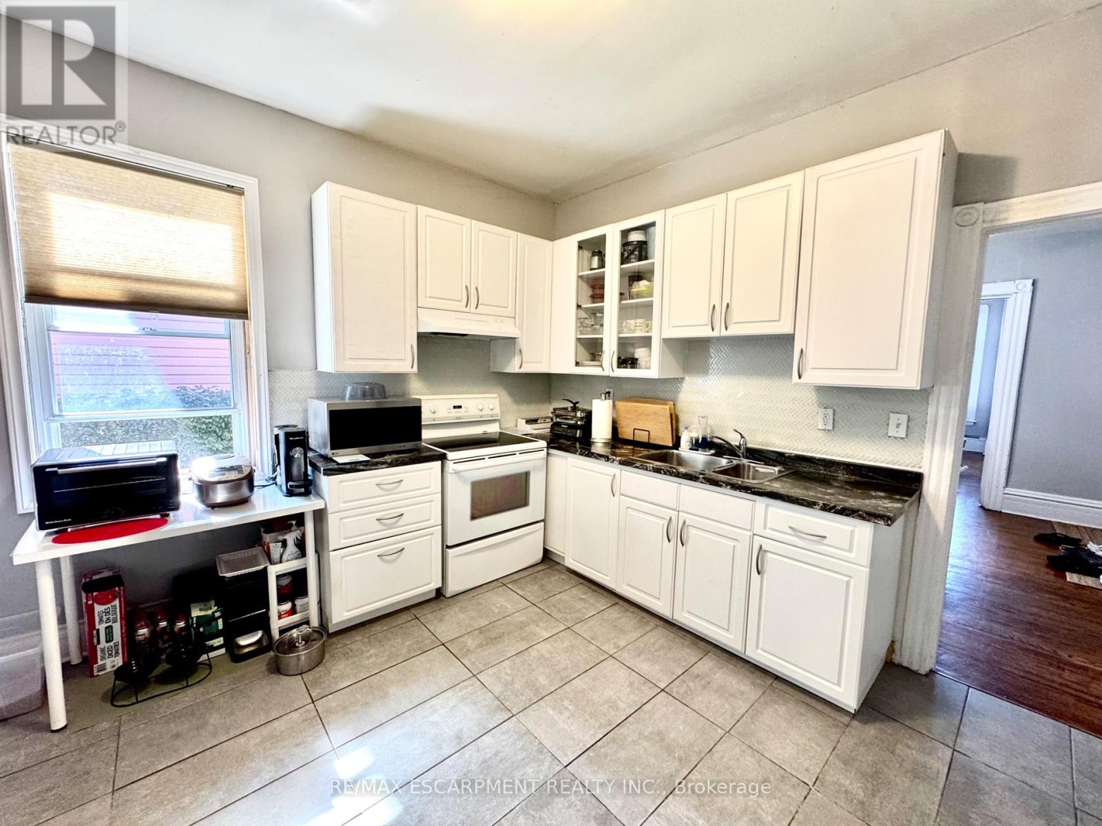 1 - 108 Birch Avenue, Hamilton, Ontario  L8L 6H7 - Photo 3 - X12452000
