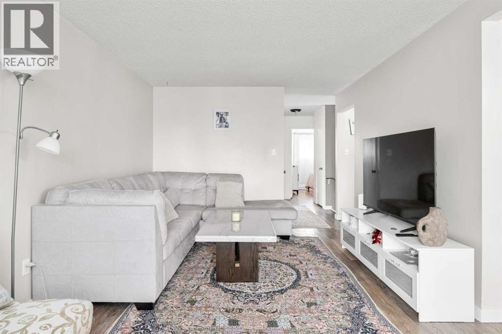 7827 Hunterquay Road Nw, Calgary, Alberta  T2K 4T8 - Photo 10 - A2263143