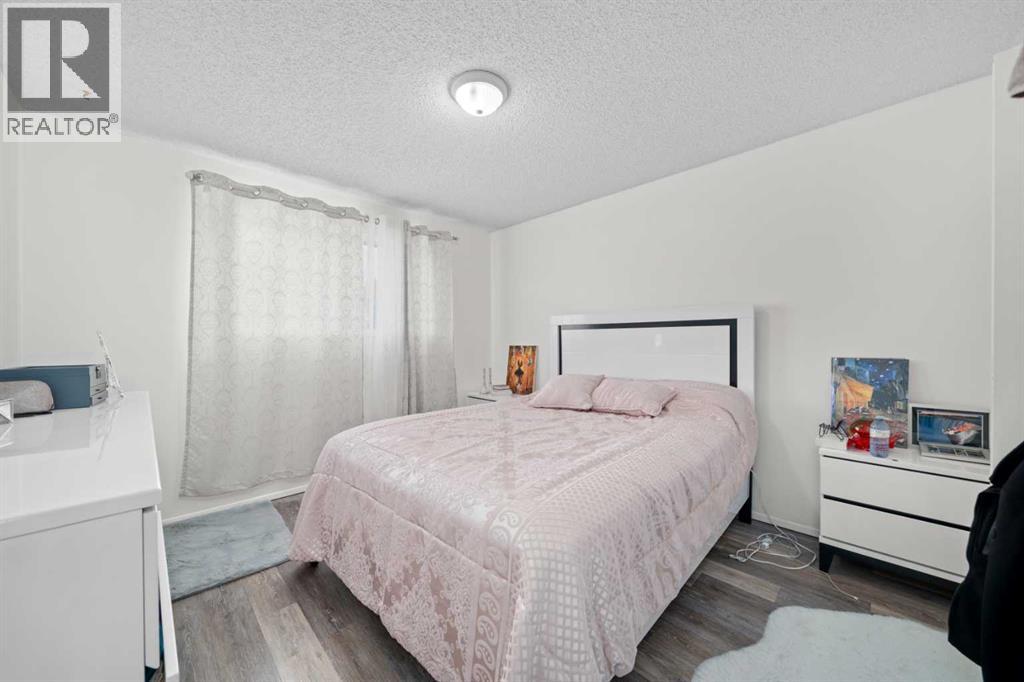 7827 Hunterquay Road Nw, Calgary, Alberta  T2K 4T8 - Photo 12 - A2263143
