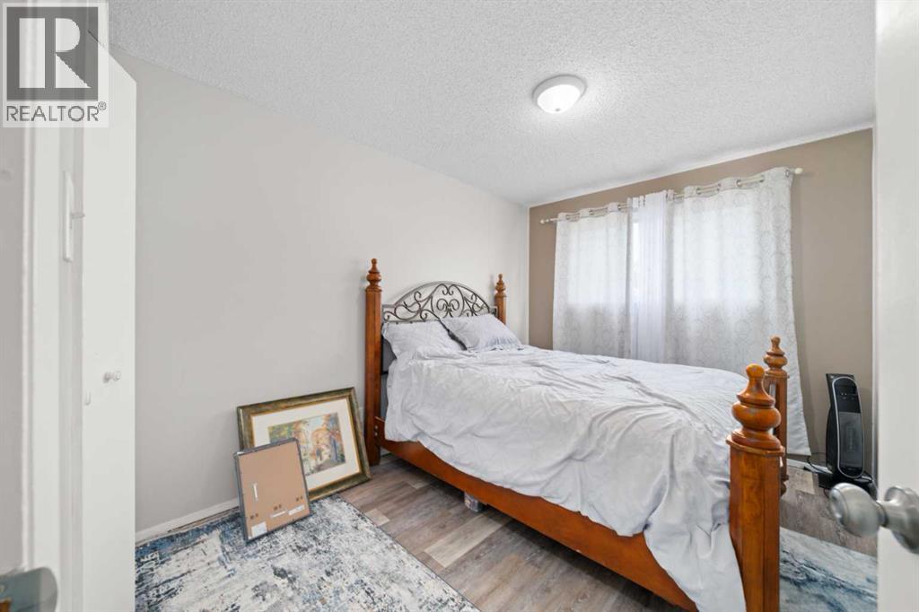 7827 Hunterquay Road Nw, Calgary, Alberta  T2K 4T8 - Photo 13 - A2263143