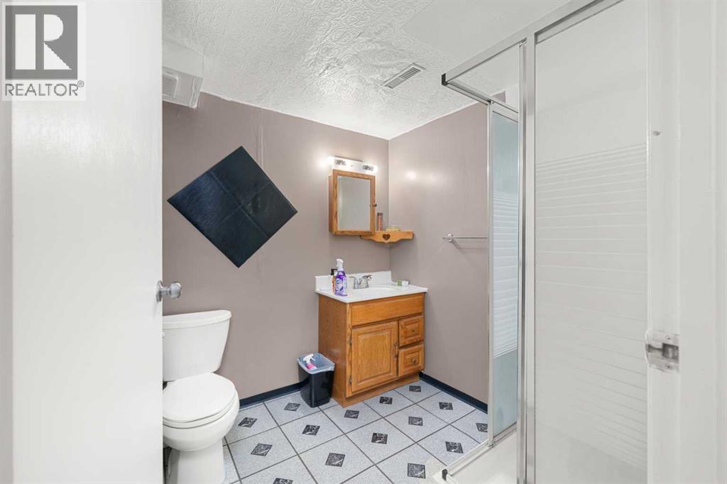 7827 Hunterquay Road Nw, Calgary, Alberta  T2K 4T8 - Photo 18 - A2263143