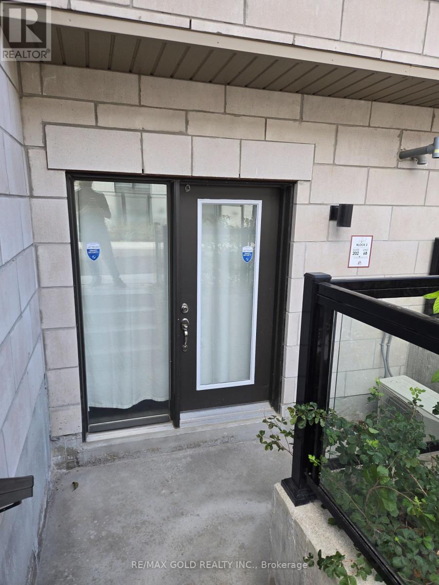 202 - 30 Halliford Place, Brampton, Ontario  L4P 4R1 - Photo 3 - W12410694