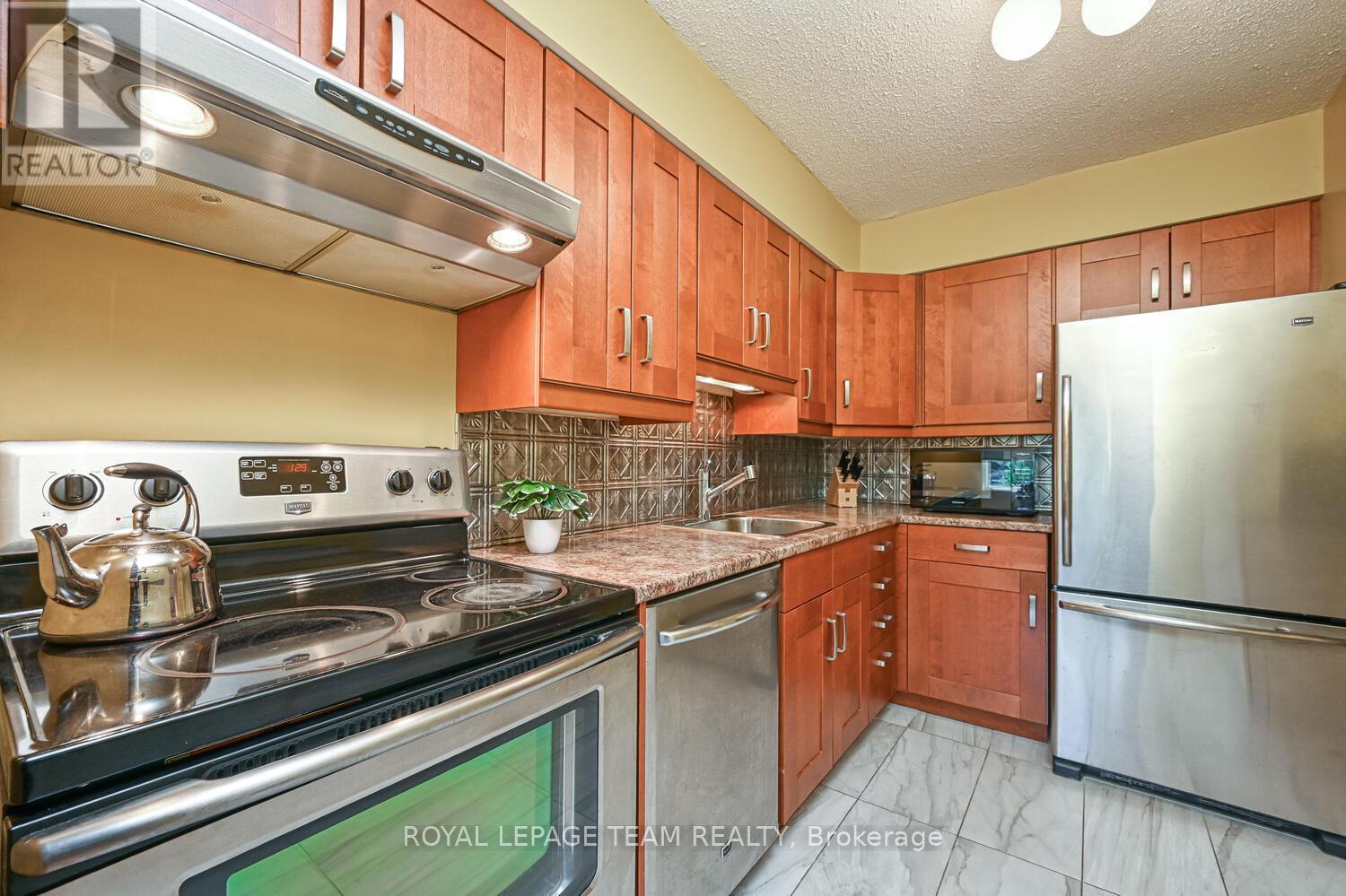 403 - 800 Mckellar Avenue, Ottawa, Ontario  K2A 2X5 - Photo 12 - X12452496
