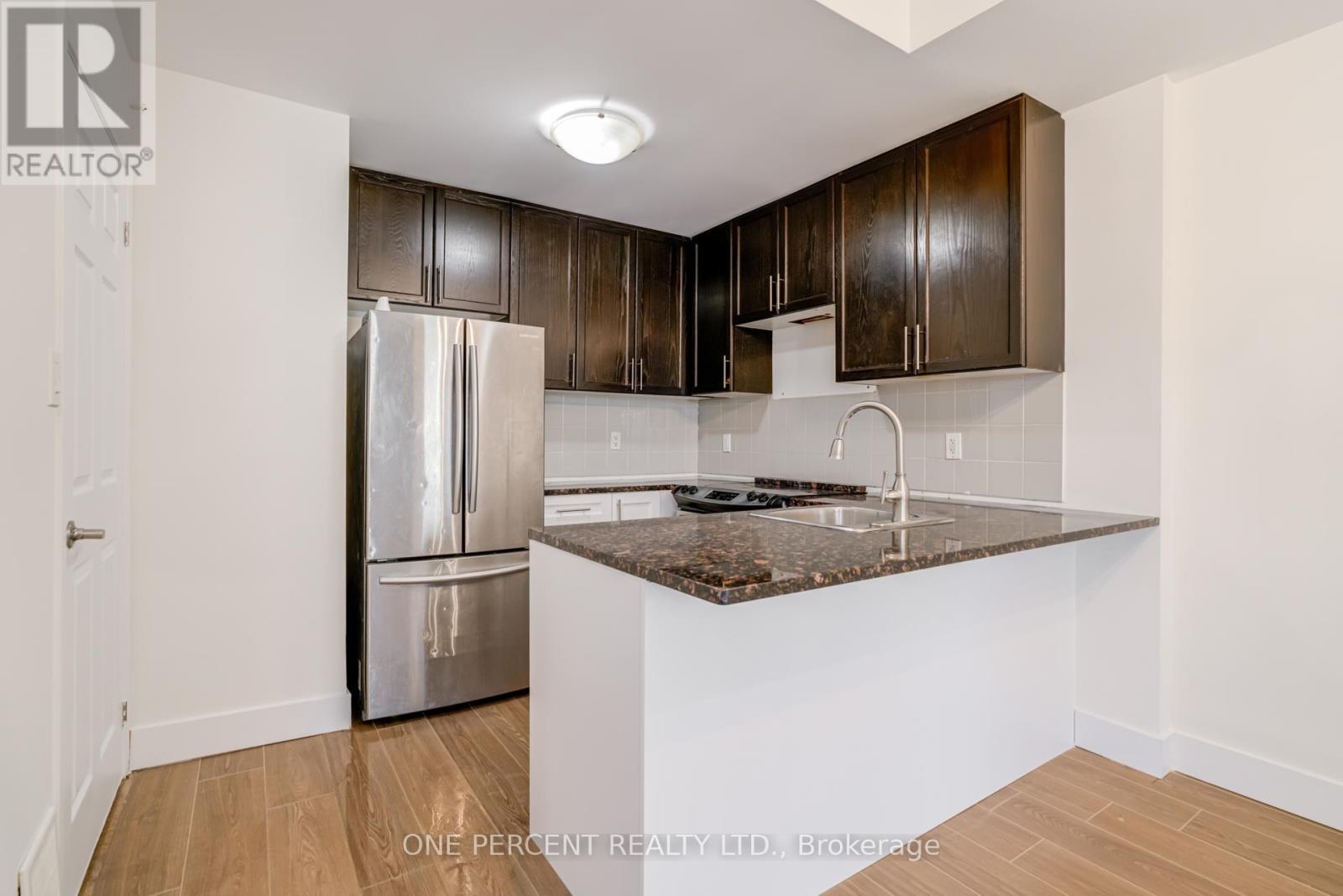 12 - 25 Coneflower Crescent, Toronto, Ontario  M2R 0A5 - Photo 8 - C12452457