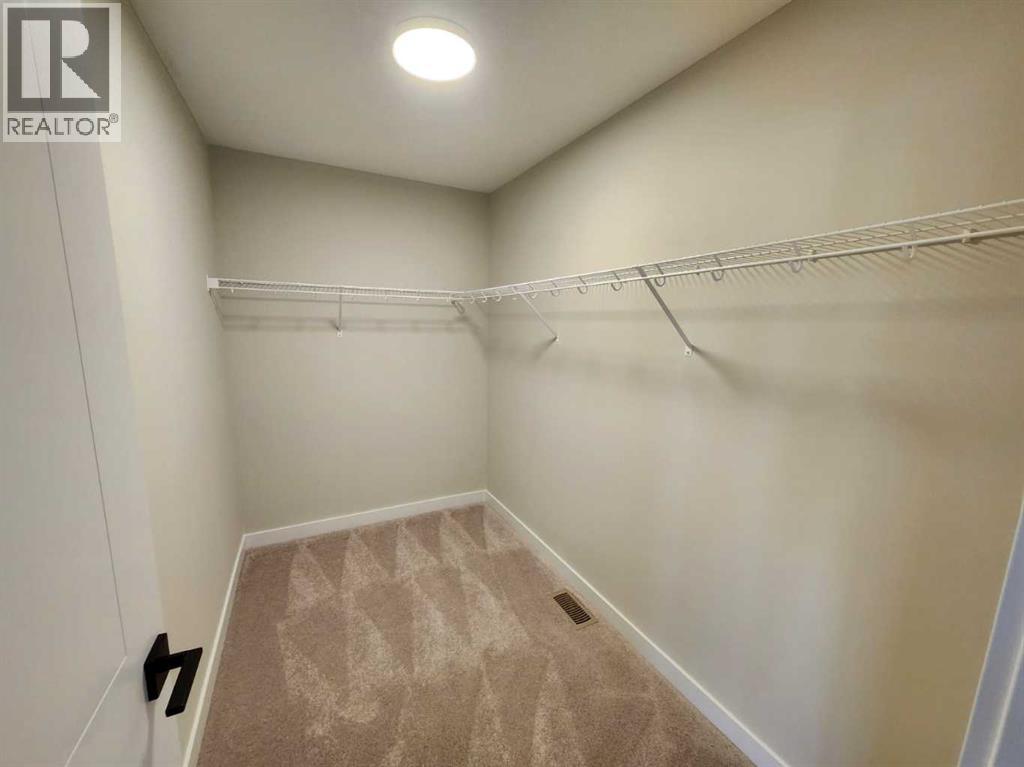15 Belgian Court, Cochrane, Alberta  T4C 3H5 - Photo 15 - A2252398