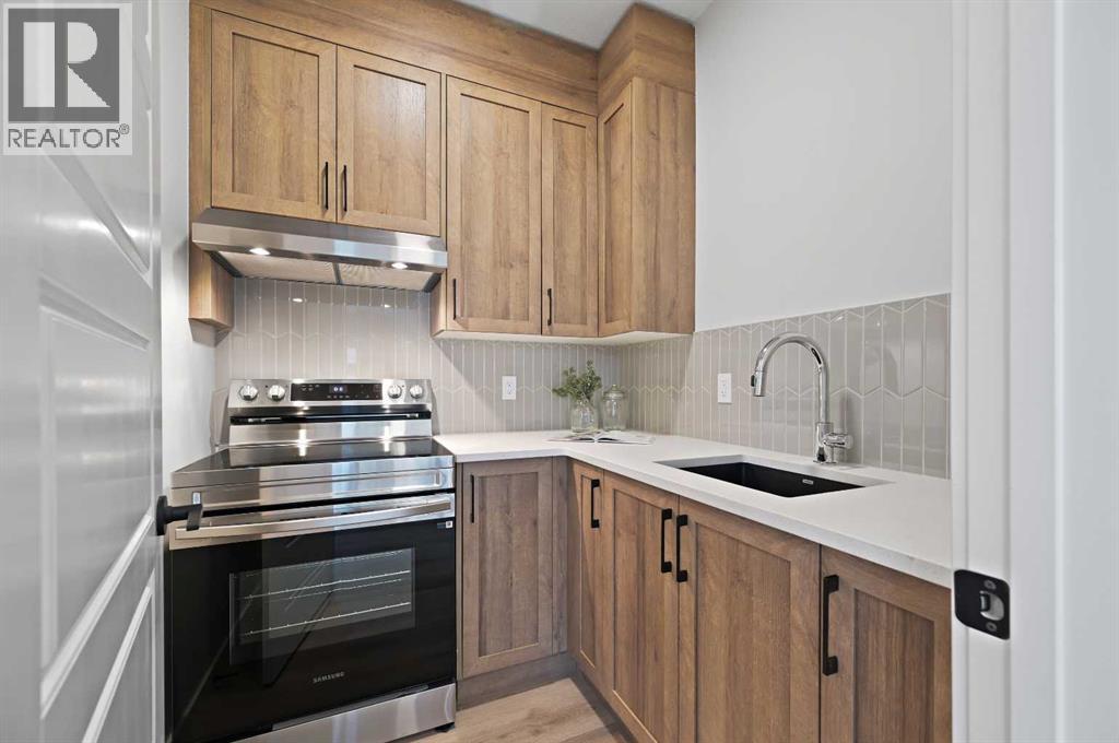 564 Baywater Manor Sw, Airdrie, Alberta  T4B 3V5 - Photo 6 - A2236064