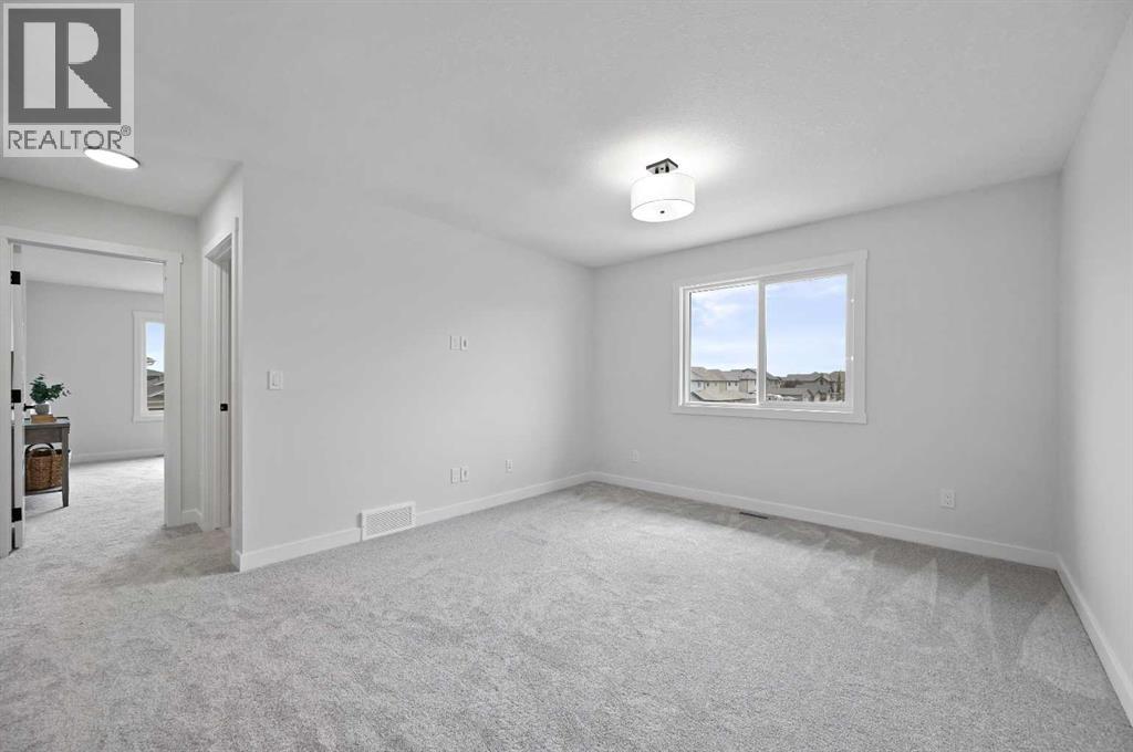 564 Baywater Manor Sw, Airdrie, Alberta  T4B 3V5 - Photo 17 - A2236064