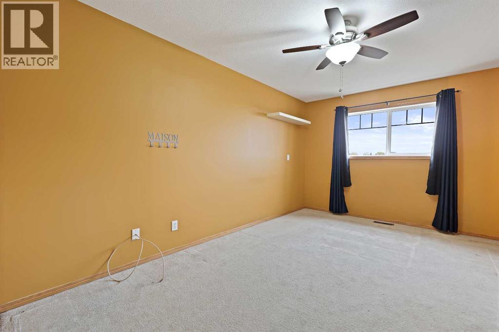 30 Meadowpark Place, Carstairs, Alberta  T0M 0N0 - Photo 18 - A2261073