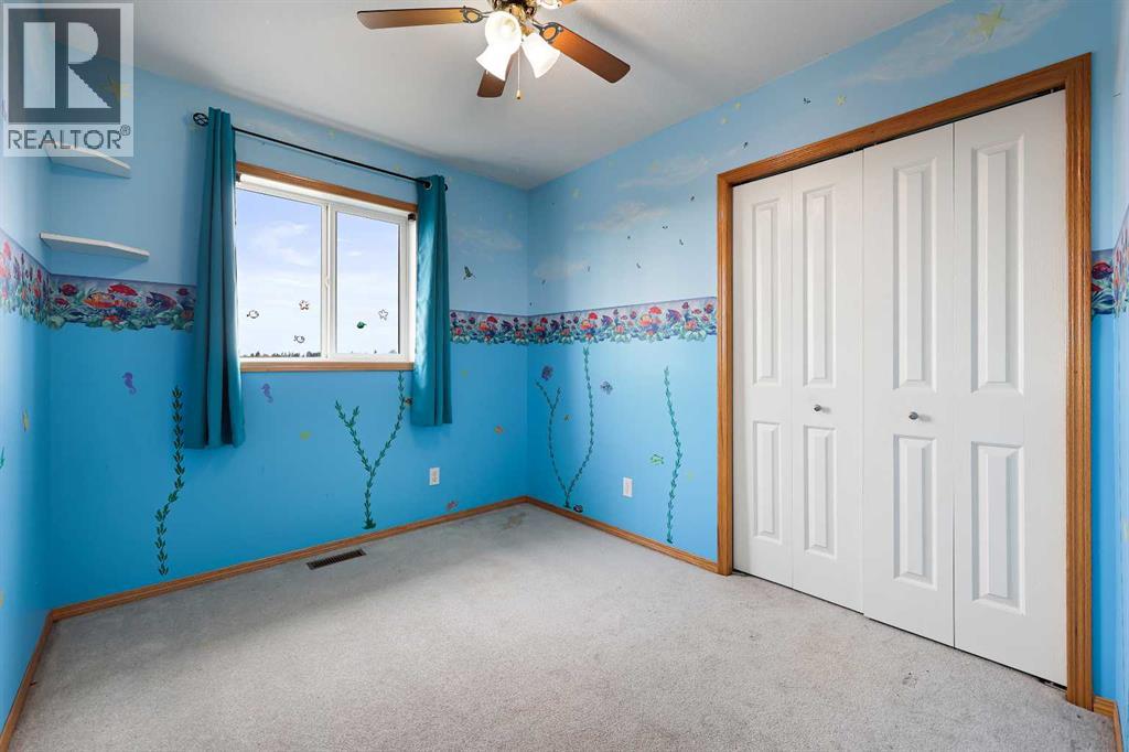 30 Meadowpark Place, Carstairs, Alberta  T0M 0N0 - Photo 25 - A2261073
