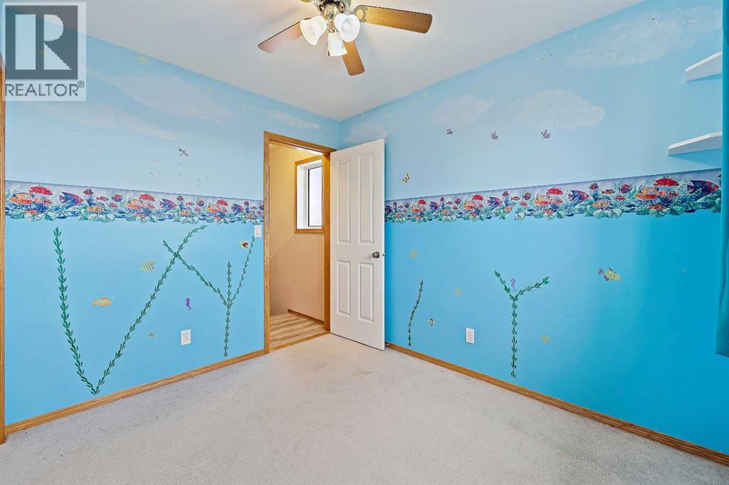 30 Meadowpark Place, Carstairs, Alberta  T0M 0N0 - Photo 26 - A2261073