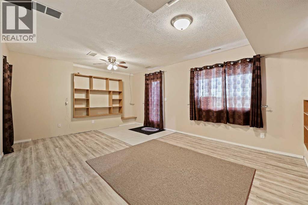 30 Meadowpark Place, Carstairs, Alberta  T0M 0N0 - Photo 30 - A2261073