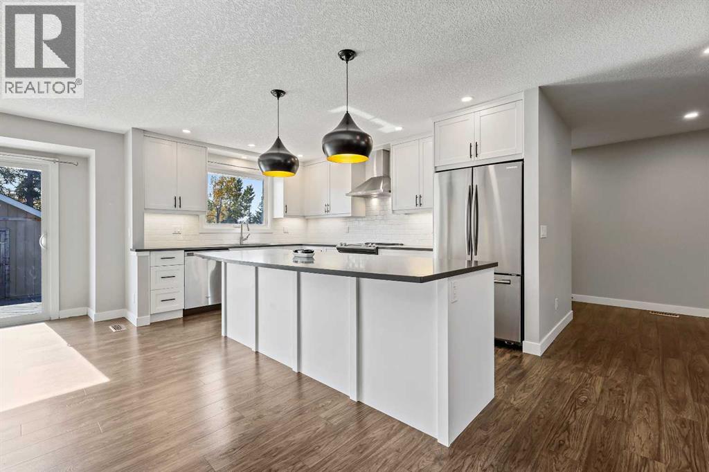 2003 117 Avenue Sw, Calgary, Alberta  T2W 2Y7 - Photo 6 - A2262740