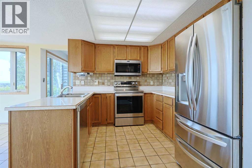 7047 Edgemont Drive Nw, Calgary, Alberta  T3A 2H9 - Photo 11 - A2230579