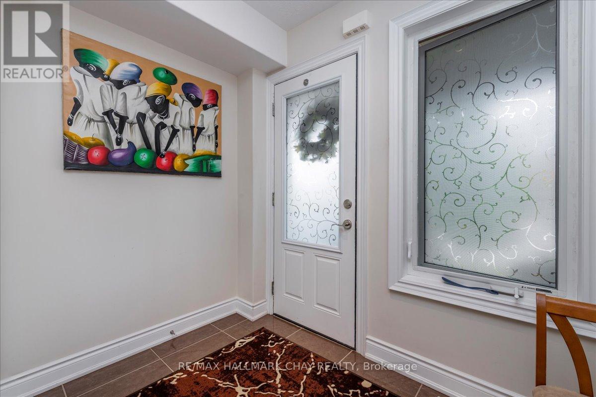 7 - 90 Sovereigns Gate, Barrie, Ontario  L4N 0Y9 - Photo 3 - S12435014