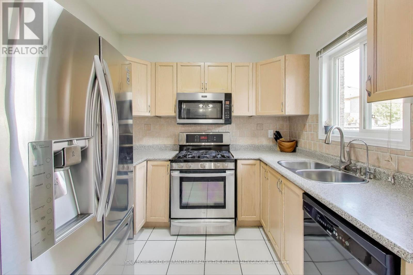 283 Van Kirk Drive, Brampton, Ontario  L7A 1M3 - Photo 2 - W12453028