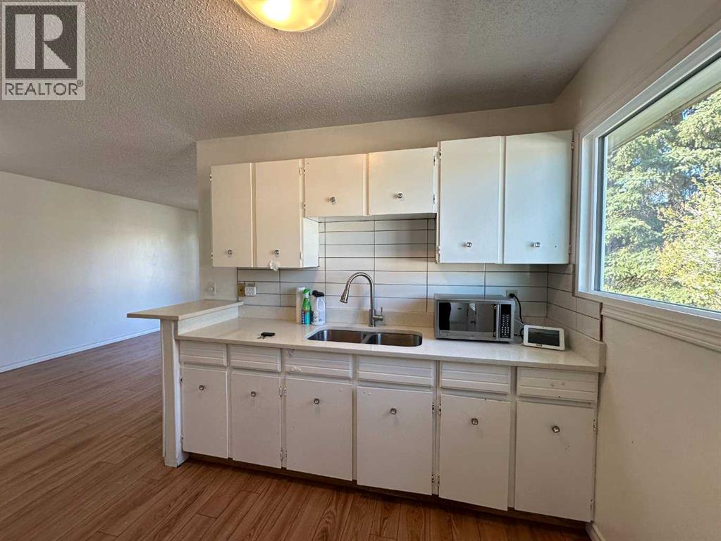 121 Huntford Close Ne, Calgary, Alberta  T2K 3Y7 - Photo 10 - A2259210