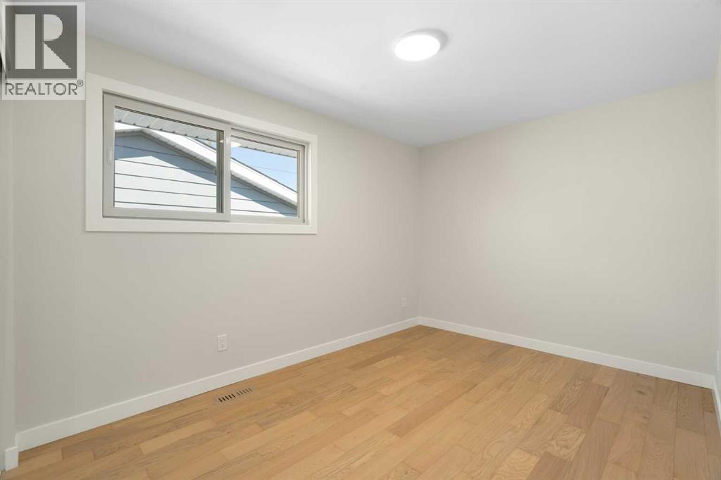 924 Canna Crescent Sw, Calgary, Alberta  T2W 1N9 - Photo 19 - A2257732