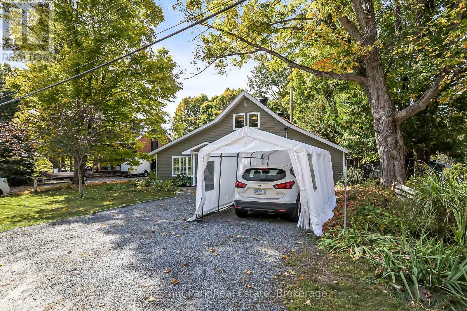 1226 Milford Bay Road, Muskoka Lakes, Ontario  P0B 1E0 - Photo 6 - X12453327