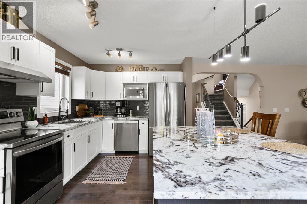 20 Tuscarora Place Nw, Calgary, Alberta  T3L 2G1 - Photo 7 - A2261026