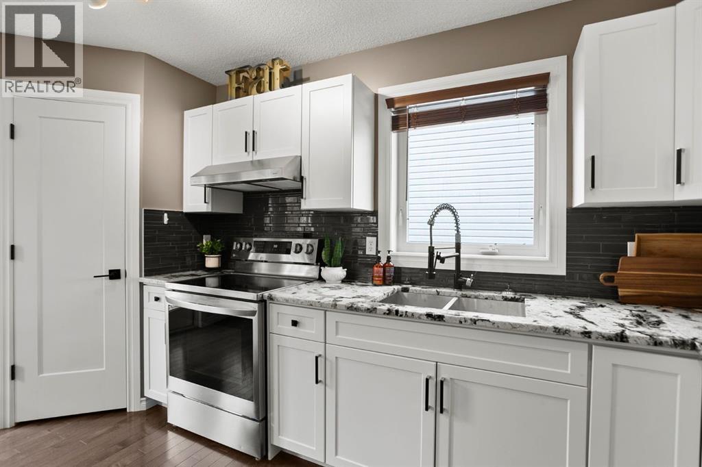 20 Tuscarora Place Nw, Calgary, Alberta  T3L 2G1 - Photo 8 - A2261026