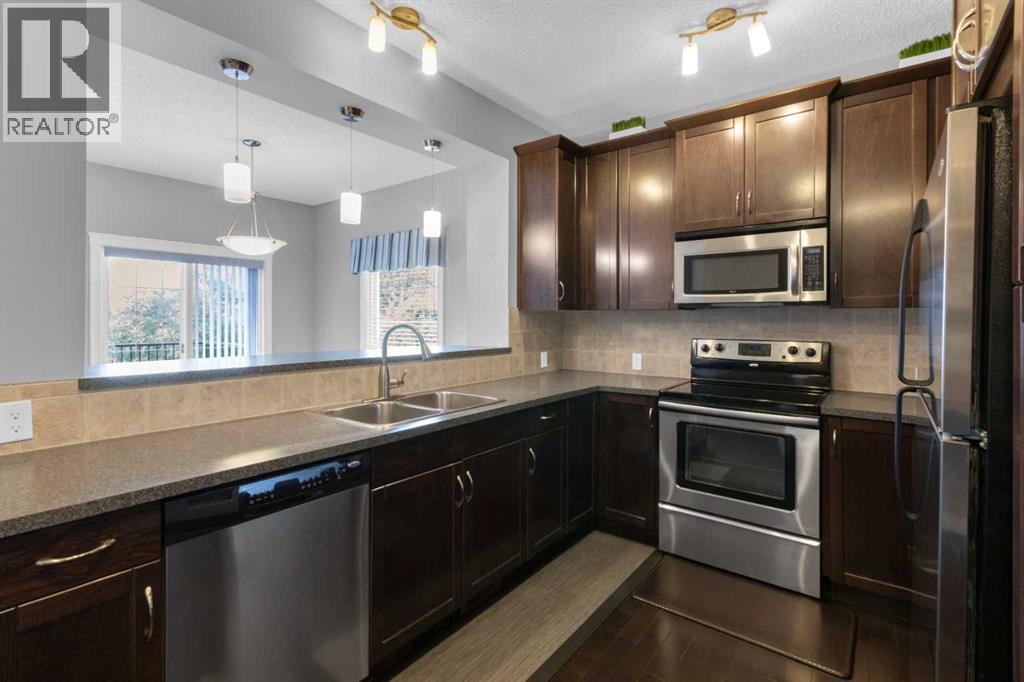 57 Evanscove Manor Nw, Calgary, Alberta  T3P 0E5 - Photo 5 - A2256153