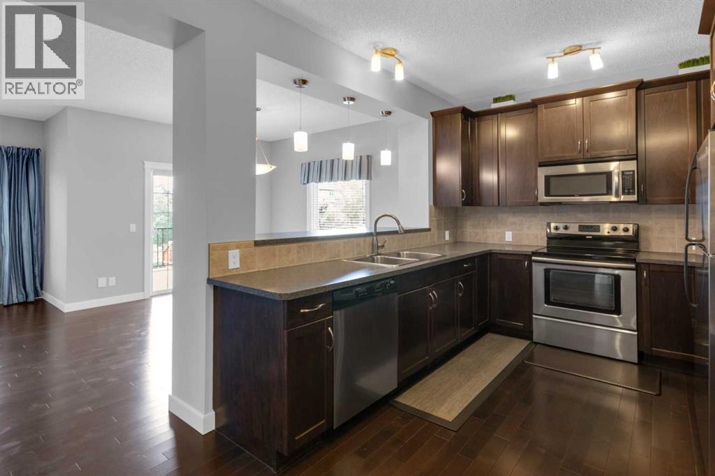 57 Evanscove Manor Nw, Calgary, Alberta  T3P 0E5 - Photo 3 - A2256153