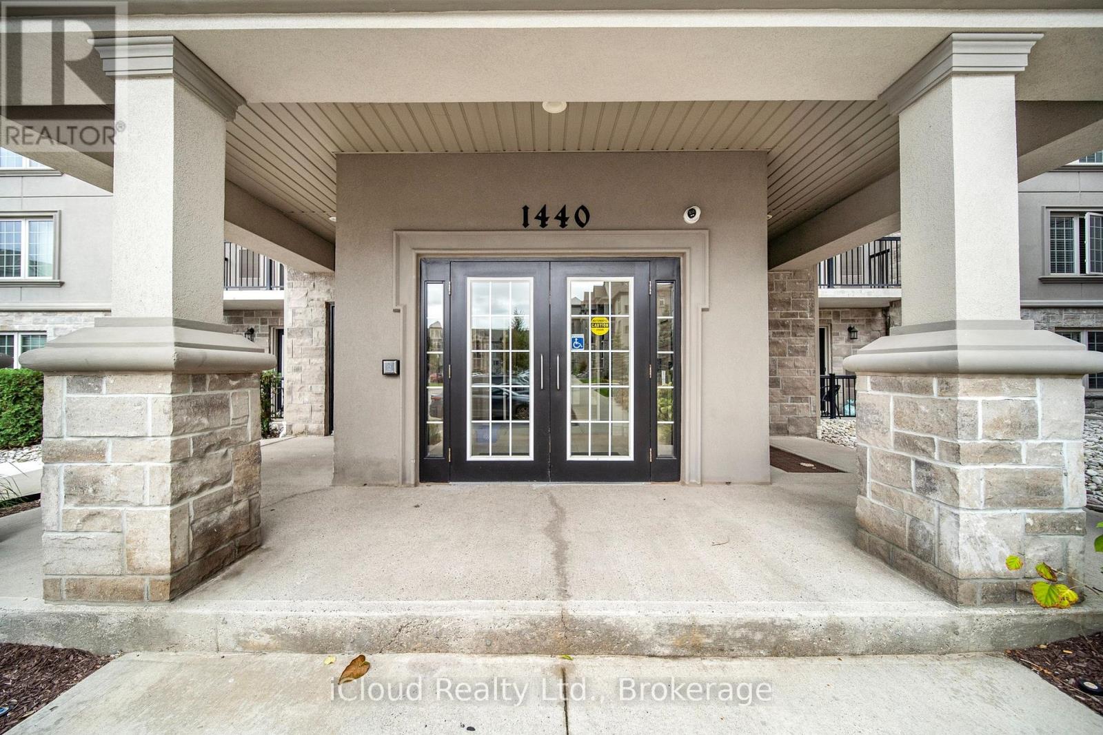 411 - 1440 Main Street E, Milton, Ontario  L9T 8W3 - Photo 1 - W12453364