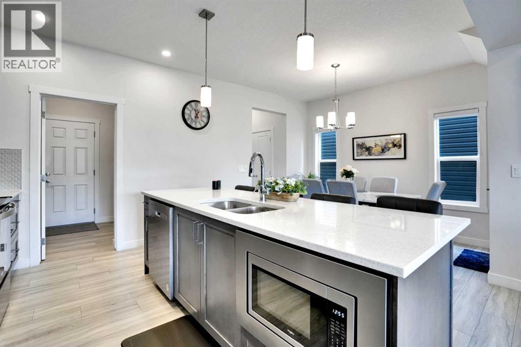 1457 Bayview Point Sw, Airdrie, Alberta  T4B 5K2 - Photo 10 - A2247408
