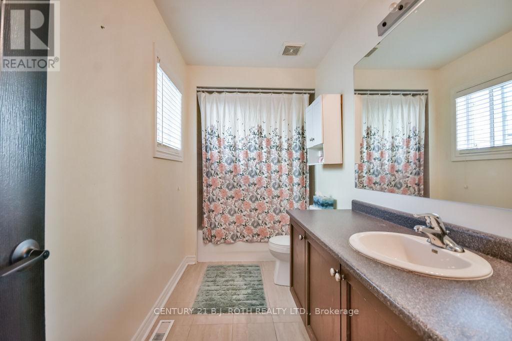 63 The Queensway, Barrie (Innis-Shore), Ontario  L4M 7J3 - Photo 24 - S12453495