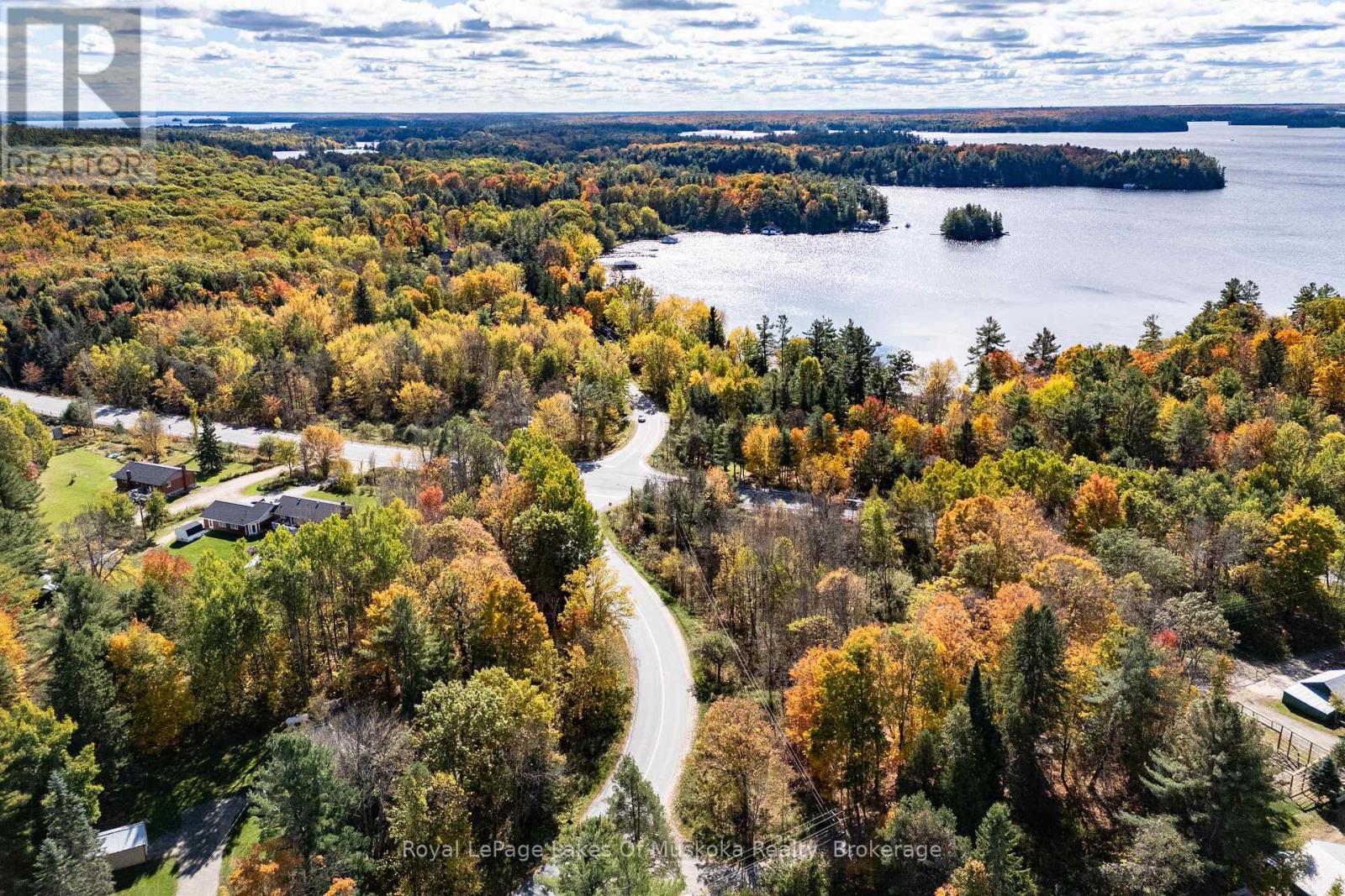 1015 Hewlitt Road, Muskoka Lakes (Monck (Muskoka Lakes)), Ontario  P1L 0J4 - Photo 8 - X12453677