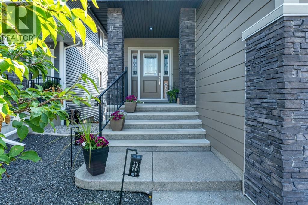 106 Mount Rae Heights, Okotoks, Alberta  T1S 0P1 - Photo 2 - A2256958