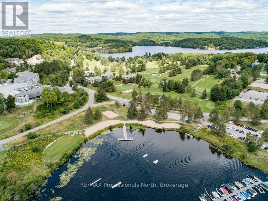 100 - 25 Pen Lake Point Road, Huntsville (Chaffey), Ontario  P1H 1A9 - Photo 6 - X12453981