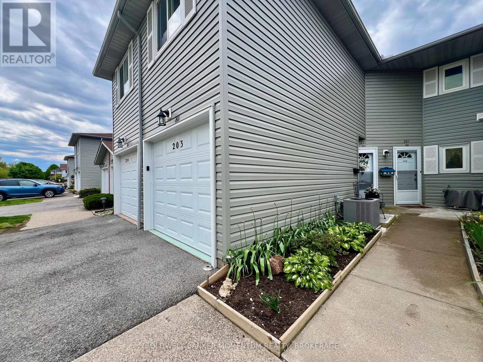 203 - 201 Dorchester Boulevard, St. Catharines, Ontario  L2M 7W1 - Photo 2 - X12453968