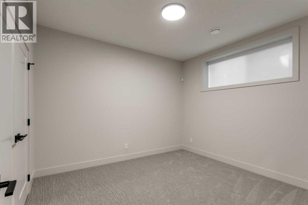 8 Rockcliff Hill Nw, Calgary, Alberta  T3G 0G6 - Photo 37 - A2261743