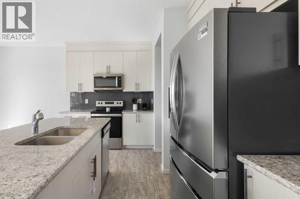 124 Carringham Way Nw, Calgary, Alberta  T3P 1V2 - Photo 11 - A2262475